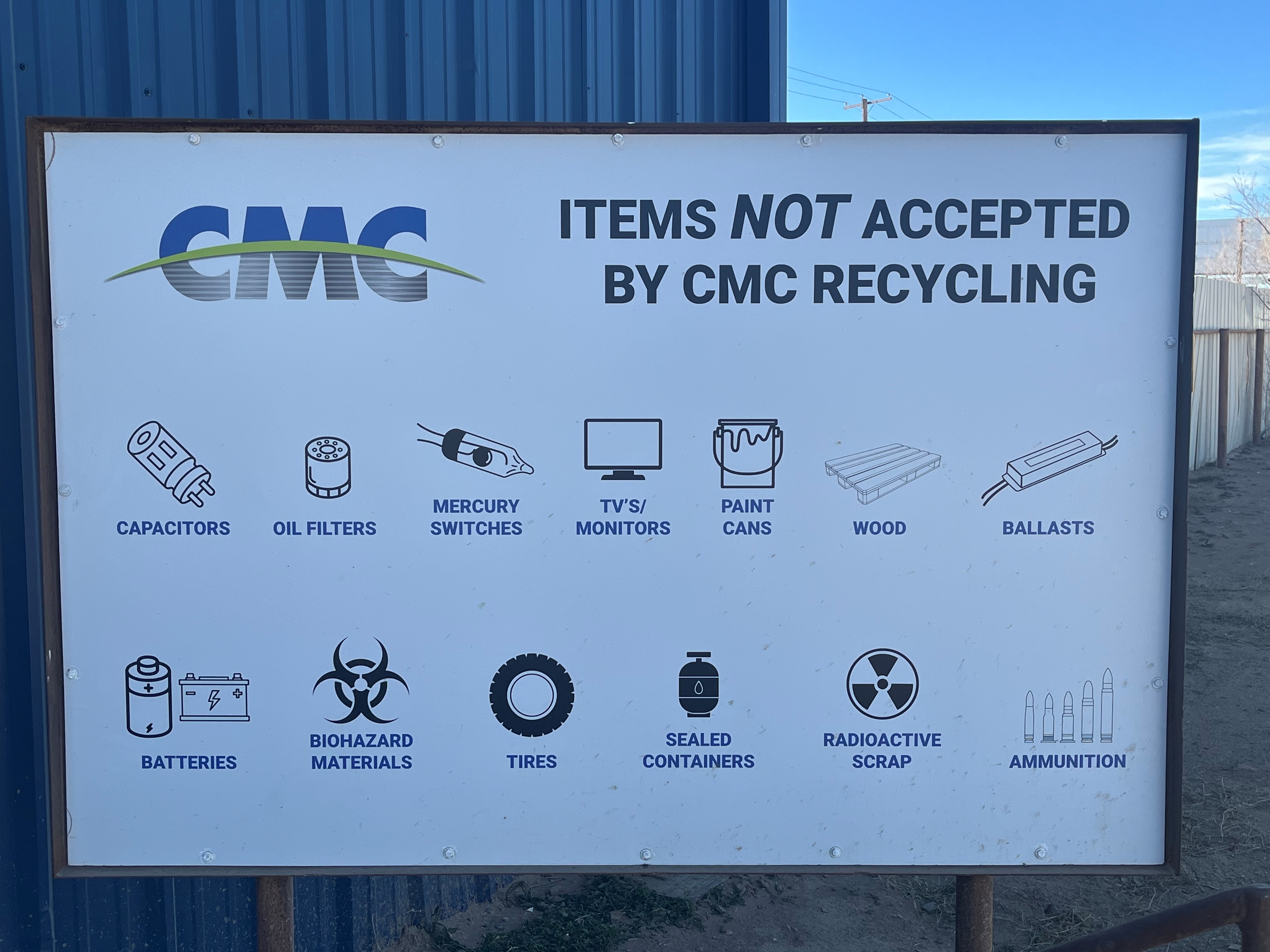Close up photo of sign showing a list of items not accepted at CMC Recycling Midland.